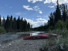 Canoes along quiet Athabasca channel